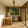 NOOK Base garden office with the Esquina NOOK Work rotating desk open for a meeting