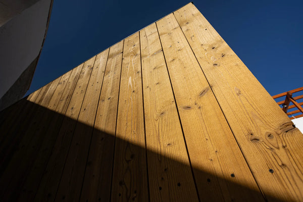 Thermo-treated timber grain in full sun